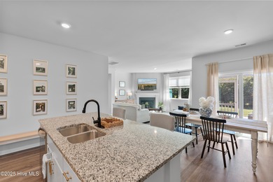 Nestled in the highly sought-after Brunswick Forest community on Cape Fear National At Brunswick Forest in North Carolina - for sale on GolfHomes.com, golf home, golf lot