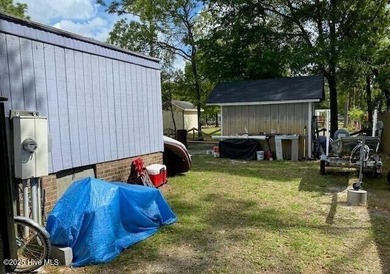 Excellent opportunity to acquire a fully rented four-property on The Lakes Country Club in North Carolina - for sale on GolfHomes.com, golf home, golf lot