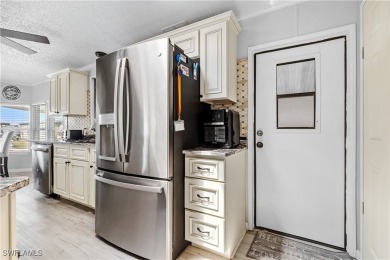 Fully Renovated  Move-In Ready Home in Tamiami Village - 55+ on Six Lakes Country Club in Florida - for sale on GolfHomes.com, golf home, golf lot