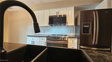 Welcome to easy, stylish living in the highly sought-after on Mayfair Country Club in Ohio - for sale on GolfHomes.com, golf home, golf lot