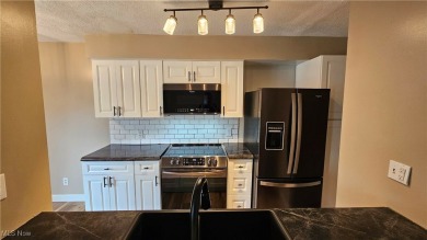 Welcome to easy, stylish living in the highly sought-after on Mayfair Country Club in Ohio - for sale on GolfHomes.com, golf home, golf lot