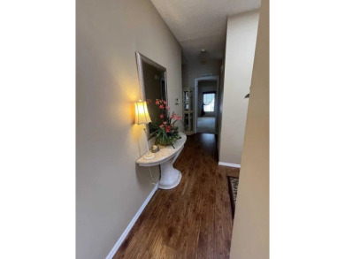 Welcome to this beautifully maintained two-bedroom, two-bath on Pine Lakes Country Club in Florida - for sale on GolfHomes.com, golf home, golf lot