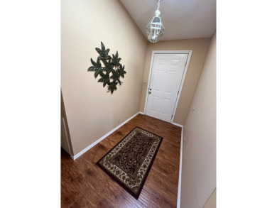 Welcome to this beautifully maintained two-bedroom, two-bath on Pine Lakes Country Club in Florida - for sale on GolfHomes.com, golf home, golf lot