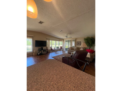Welcome to this beautifully maintained two-bedroom, two-bath on Pine Lakes Country Club in Florida - for sale on GolfHomes.com, golf home, golf lot