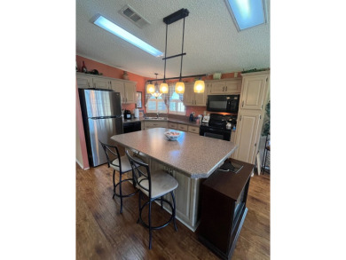Welcome to this beautifully maintained two-bedroom, two-bath on Pine Lakes Country Club in Florida - for sale on GolfHomes.com, golf home, golf lot