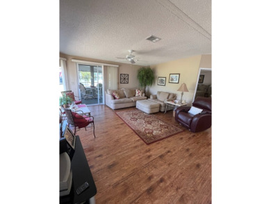 Welcome to this beautifully maintained two-bedroom, two-bath on Pine Lakes Country Club in Florida - for sale on GolfHomes.com, golf home, golf lot