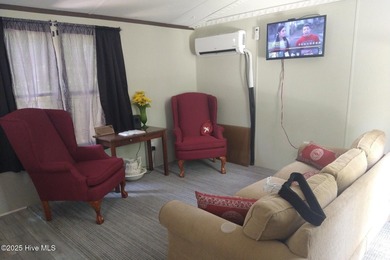 Investor opportunity! This 3-bedroom, 1.5-bath manufactured home on The Lakes Country Club in North Carolina - for sale on GolfHomes.com, golf home, golf lot