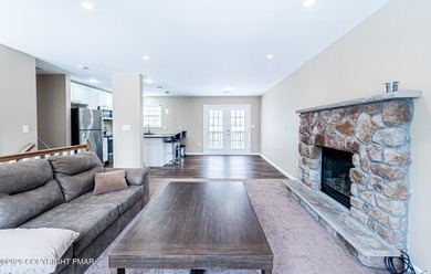 CHARMING UPGRADED BRIARCLIFF TERRACE POCONOS LAKE BI-LEVEL HOME on Pocono Farms Country Club in Pennsylvania - for sale on GolfHomes.com, golf home, golf lot