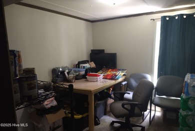 Investor opportunity! This 3-bedroom, 1.5-bath manufactured home on The Lakes Country Club in North Carolina - for sale on GolfHomes.com, golf home, golf lot