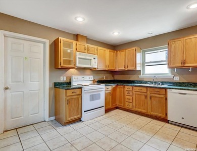 Discover comfort, convenience, and community in this 3-bedroom on Diamondhead Golf and Country Club in Arkansas - for sale on GolfHomes.com, golf home, golf lot