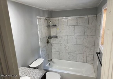 Income-producing rental with reliable tenants! This 2-bedroom on The Lakes Country Club in North Carolina - for sale on GolfHomes.com, golf home, golf lot