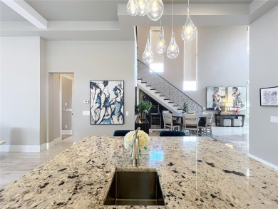 This is an exceptional opportunity to own a modern masterpiece on Bella Collina Golf Club in Florida - for sale on GolfHomes.com, golf home, golf lot