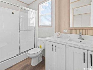 2025 NEW HOME located in the coastal getaway in 55+ Waterway on Barefoot Resort and Golf Club  in South Carolina - for sale on GolfHomes.com, golf home, golf lot