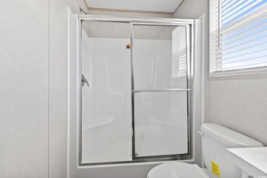 2025 NEW HOME located in the coastal getaway in 55+ Waterway on Barefoot Resort and Golf Club  in South Carolina - for sale on GolfHomes.com, golf home, golf lot