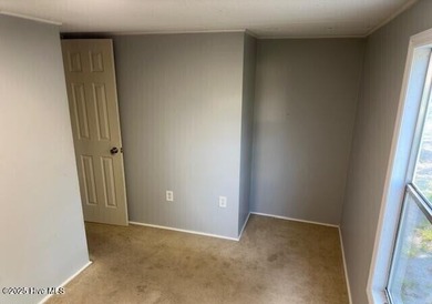 Income-producing rental with reliable tenants! This 2-bedroom on The Lakes Country Club in North Carolina - for sale on GolfHomes.com, golf home, golf lot