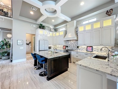 This is an exceptional opportunity to own a modern masterpiece on Bella Collina Golf Club in Florida - for sale on GolfHomes.com, golf home, golf lot