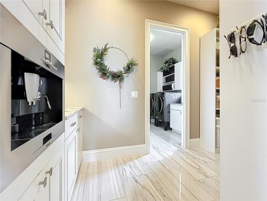 This is an exceptional opportunity to own a modern masterpiece on Bella Collina Golf Club in Florida - for sale on GolfHomes.com, golf home, golf lot