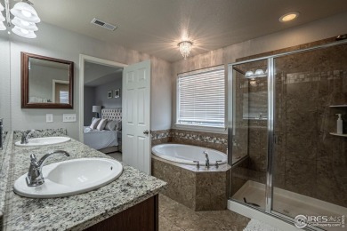 Located in a quiet cul-de-sac on an oversized lot, this on Pelican Lakes Golf and Country Club in Colorado - for sale on GolfHomes.com, golf home, golf lot