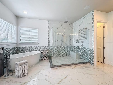 This is an exceptional opportunity to own a modern masterpiece on Bella Collina Golf Club in Florida - for sale on GolfHomes.com, golf home, golf lot