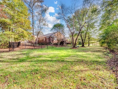 Beautifully renovated Olde Sycamore ranch home nestled on a on Olde Sycamore Golf Plantation in North Carolina - for sale on GolfHomes.com, golf home, golf lot