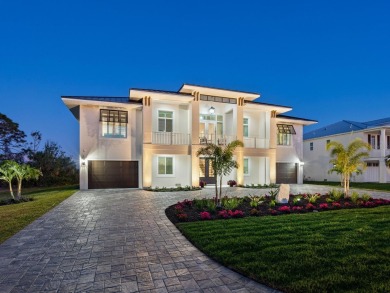 Custom home with fairway and water views! As you drive south on on Lemon Bay Golf Club in Florida - for sale on GolfHomes.com, golf home, golf lot