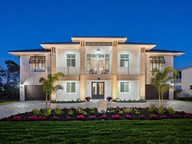 Custom home with fairway and water views! As you drive south on on Lemon Bay Golf Club in Florida - for sale on GolfHomes.com, golf home, golf lot
