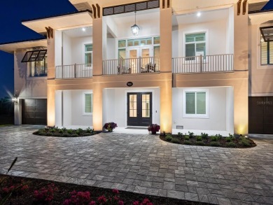 Custom home with fairway and water views! As you drive south on on Lemon Bay Golf Club in Florida - for sale on GolfHomes.com, golf home, golf lot