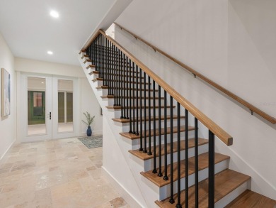 Custom home with fairway and water views! As you drive south on on Lemon Bay Golf Club in Florida - for sale on GolfHomes.com, golf home, golf lot