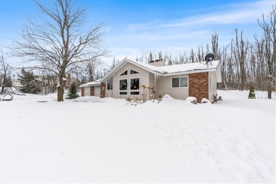 Well-maintained ranch located near Gaylord Golf Club. This on Gaylord Country Club in Michigan - for sale on GolfHomes.com, golf home, golf lot