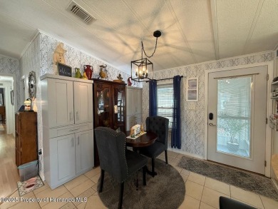 Spacious and well-appointed, this move-in ready two-bedroom on High Point Golf Club, Inc. in Florida - for sale on GolfHomes.com, golf home, golf lot