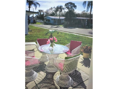 Located on a spacious corner lot in the heart of the highly on Fairway Village Golf Course in Florida - for sale on GolfHomes.com, golf home, golf lot