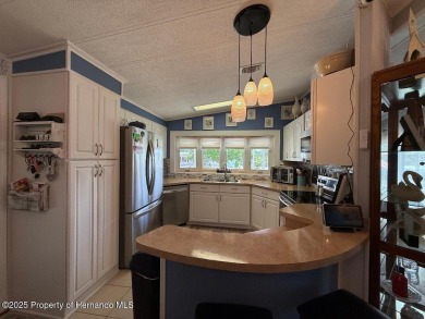 Spacious and well-appointed, this move-in ready two-bedroom on High Point Golf Club, Inc. in Florida - for sale on GolfHomes.com, golf home, golf lot