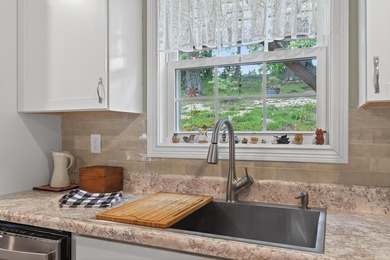 Beautifully appointed 4-bedroom, 2 1/2-bath, 2 story home with a on Berea Country Club in Kentucky - for sale on GolfHomes.com, golf home, golf lot