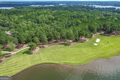 Located in the prestigious Great Waters neighborhood of Reynolds on Great Waters Course At Reynolds Plantation in Georgia - for sale on GolfHomes.com, golf home, golf lot