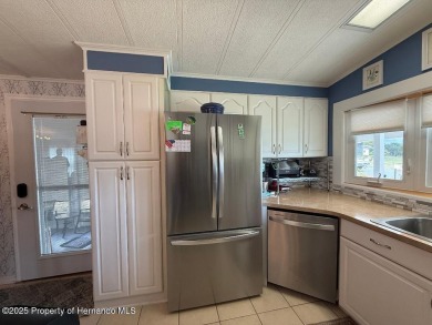 Spacious and well-appointed, this move-in ready two-bedroom on High Point Golf Club, Inc. in Florida - for sale on GolfHomes.com, golf home, golf lot