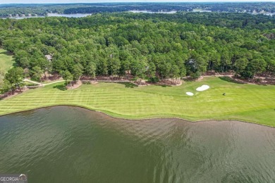 Located in the prestigious Great Waters neighborhood of Reynolds on Great Waters Course At Reynolds Plantation in Georgia - for sale on GolfHomes.com, golf home, golf lot