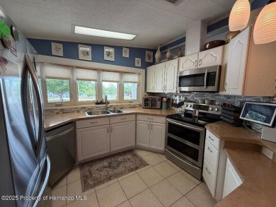 Spacious and well-appointed, this move-in ready two-bedroom on High Point Golf Club, Inc. in Florida - for sale on GolfHomes.com, golf home, golf lot