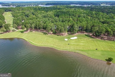 Located in the prestigious Great Waters neighborhood of Reynolds on Great Waters Course At Reynolds Plantation in Georgia - for sale on GolfHomes.com, golf home, golf lot