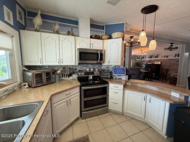 Spacious and well-appointed, this move-in ready two-bedroom on High Point Golf Club, Inc. in Florida - for sale on GolfHomes.com, golf home, golf lot