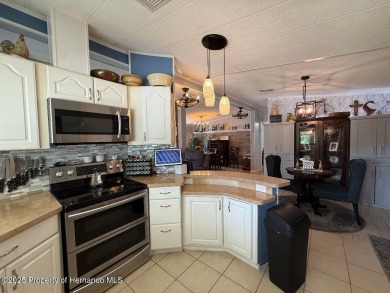 Spacious and well-appointed, this move-in ready two-bedroom on High Point Golf Club, Inc. in Florida - for sale on GolfHomes.com, golf home, golf lot