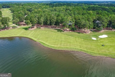 Located in the prestigious Great Waters neighborhood of Reynolds on Great Waters Course At Reynolds Plantation in Georgia - for sale on GolfHomes.com, golf home, golf lot