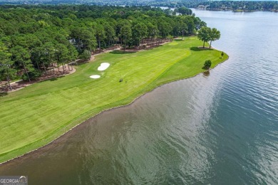 Located in the prestigious Great Waters neighborhood of Reynolds on Great Waters Course At Reynolds Plantation in Georgia - for sale on GolfHomes.com, golf home, golf lot