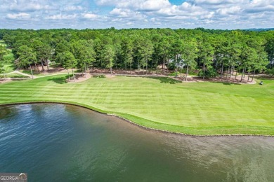 Located in the prestigious Great Waters neighborhood of Reynolds on Great Waters Course At Reynolds Plantation in Georgia - for sale on GolfHomes.com, golf home, golf lot