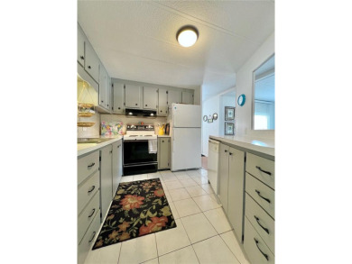 Located on a spacious corner lot in the heart of the highly on Fairway Village Golf Course in Florida - for sale on GolfHomes.com, golf home, golf lot
