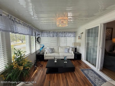 Spacious and well-appointed, this move-in ready two-bedroom on High Point Golf Club, Inc. in Florida - for sale on GolfHomes.com, golf home, golf lot