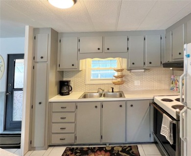 Located on a spacious corner lot in the heart of the highly on Fairway Village Golf Course in Florida - for sale on GolfHomes.com, golf home, golf lot