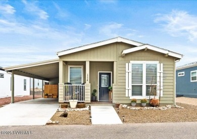 This 55+ community home features a beautifully appointed kitchen on Pine Shadows Golf Course in Arizona - for sale on GolfHomes.com, golf home, golf lot
