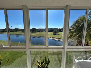 Welcome to this spacious 2-bedroom, 2-bathroom condo offering on Oriole Golf and Tennis Club in Florida - for sale on GolfHomes.com, golf home, golf lot
