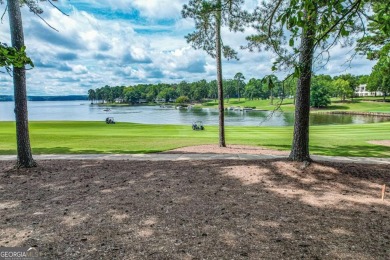 Located in the prestigious Great Waters neighborhood of Reynolds on Great Waters Course At Reynolds Plantation in Georgia - for sale on GolfHomes.com, golf home, golf lot