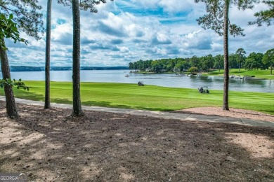 Located in the prestigious Great Waters neighborhood of Reynolds on Great Waters Course At Reynolds Plantation in Georgia - for sale on GolfHomes.com, golf home, golf lot